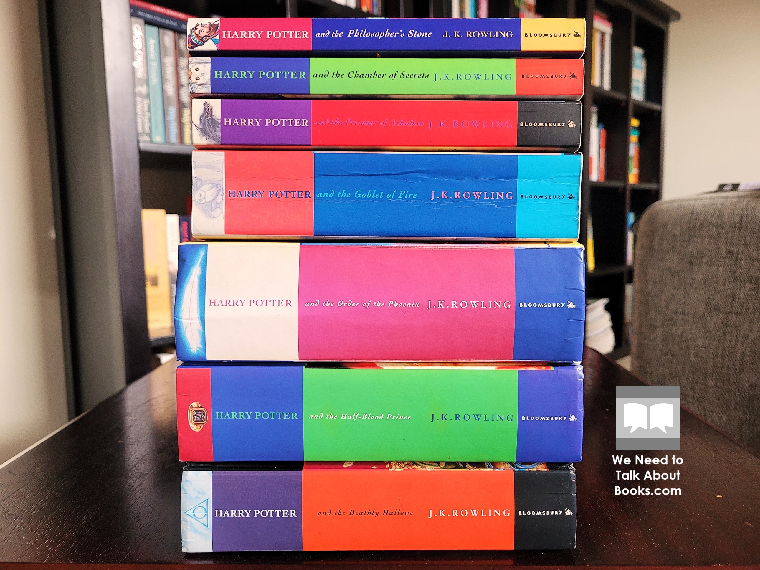 Seven books of the Harry Potter series stacked